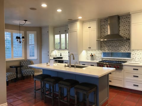 Kitchen Island with bar seating, coffee nook, and wine service bar