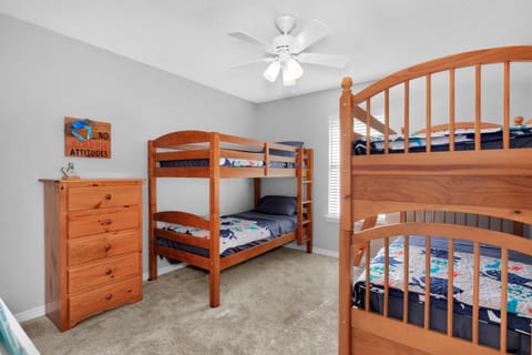 Children's bedroom with 2 bunkbeds and walk-in closet