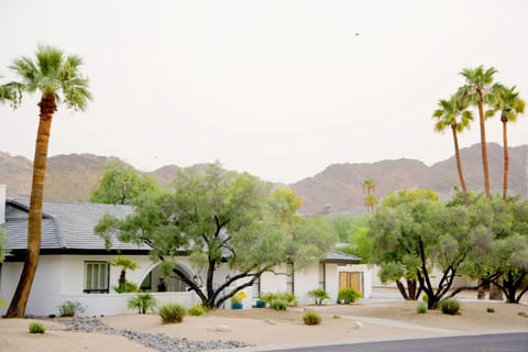 Front of the home with the Mummy Mountains in the background.