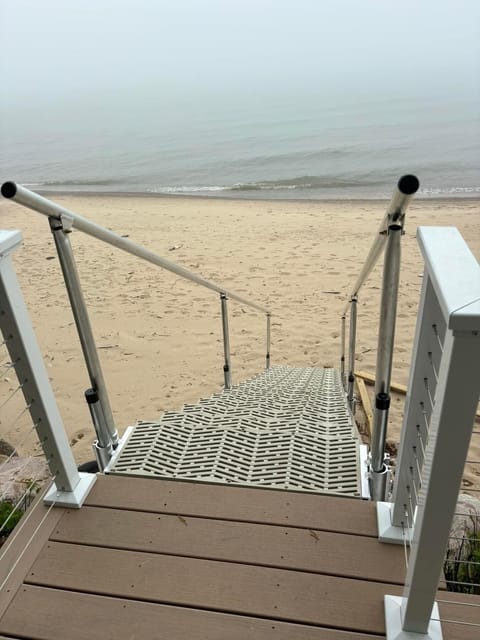 On the beach, sun loungers, beach towels