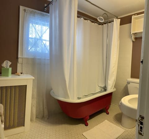 Combined shower/tub, hair dryer, towels, soap