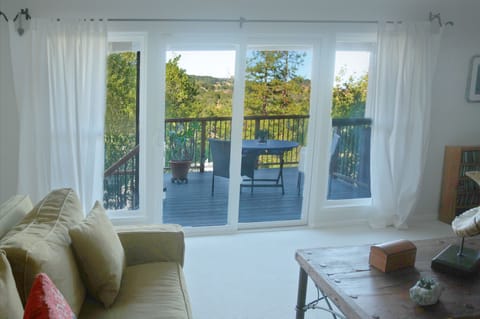 From your living room look out at your private deck and garden view