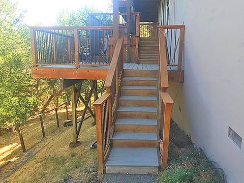 Backyard steps leading to your two private decks 