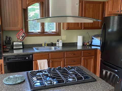 Oven, stovetop, dining tables