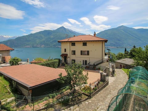 Cloud, Sky, Plant, Building, Property, Mountain, Window, Water, Azure, House