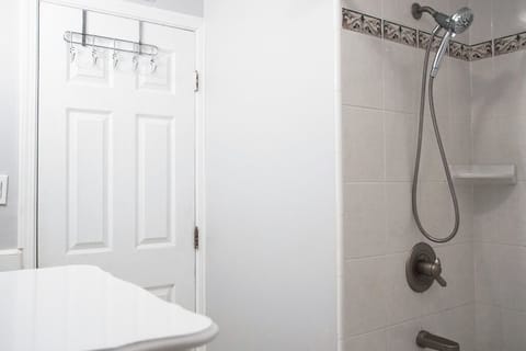 Combined shower/tub, hair dryer, towels, soap