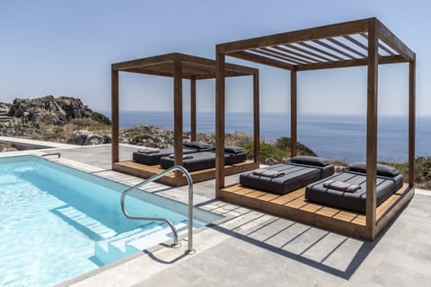 Outdoor pool, an infinity pool, sun loungers