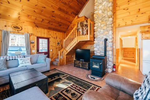 Easy to use pellet stove/fireplace and stone chimney make for a cozy setting.