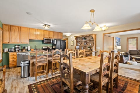 Dining Area 1 - Open foor plan, spacious dining area and kitchen with island bar seating.