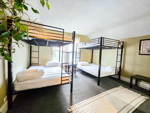 Two bunk beds with queen size mattresses