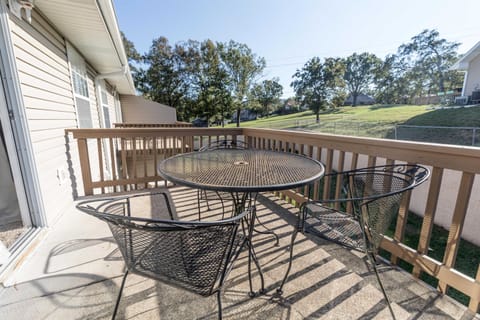 Watch golfers tee off from your private deck overlooking the fairway.