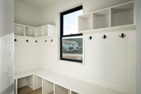 locker system in the front of the house, just inside the front door