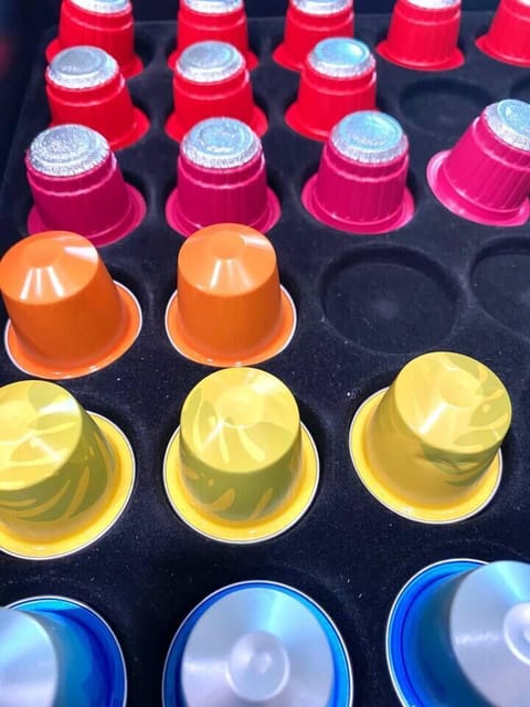 Original espresso pods provided during your stay along with ground coffee and filters to make your regular coffee using our 12-cup carafe coffee machine.  Creamer, cane sugar, Splenda and syrup are provided, also.