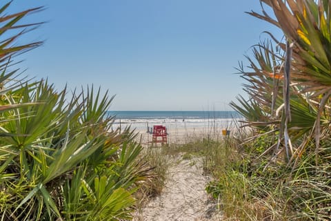 On the beach, sun loungers, beach towels