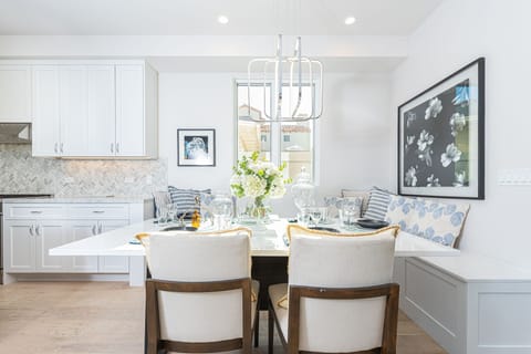 Bright and sunny eating area for 5-6 people.