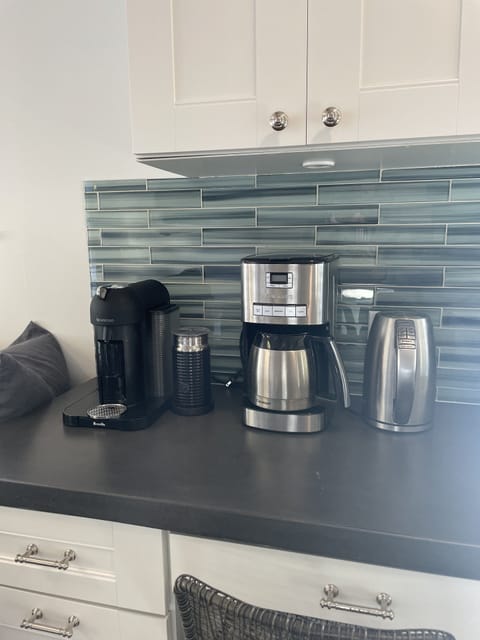 Nespresso, Cuisinart coffee maker, and electric kettle for your caffeine needs ;