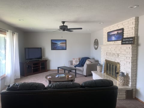 Smart TV, fireplace, books