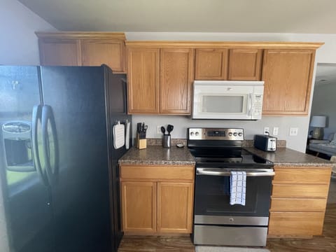 Stove, microwave, refrigerator with ice maker