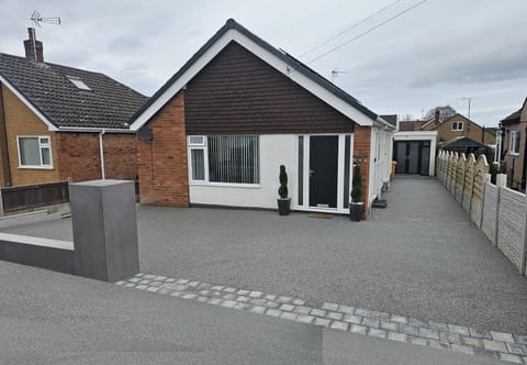 Three bedroom detached bungalow. Private drive & detached games room.