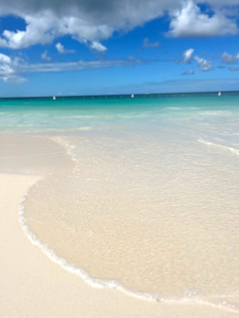 On the beach, sun loungers, beach towels