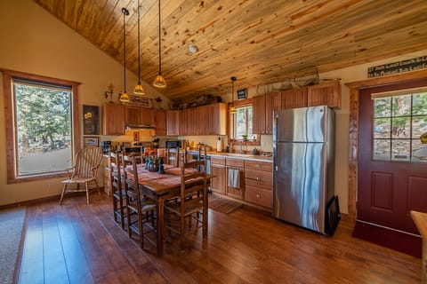 The dining area is next to the kitchen that has everything your inner chef will need.