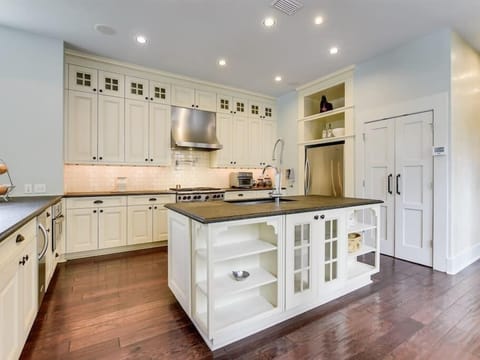 The pro-grade kitchen is spacious and filled with amenities including an icemaker and restaurant-grade appliances. Imagine having a cooking class for 10 or all the essentials you need to prepare a fabulous meal for the holiday feast.