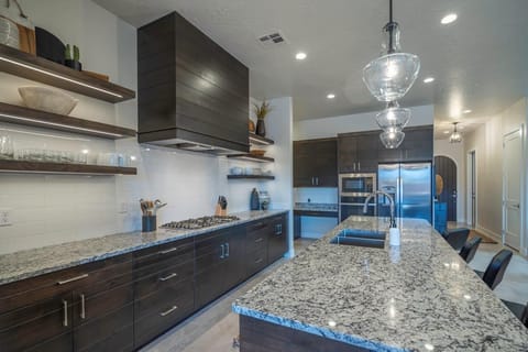 Deluxe kitchen with ample counter space and stainless steel appliances