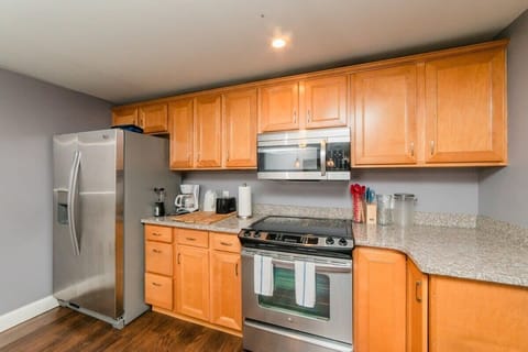 Kitchen view two, Fridge, over, dishwasher, and more