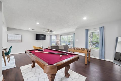 Full-size pool table and foosball table included!