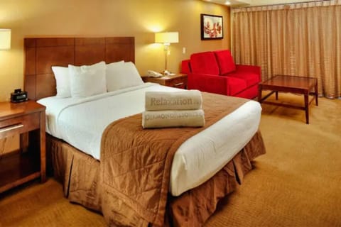 Find ultimate relaxation and comfort in the Master Suite's king size bed.