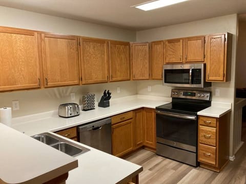 The fully equipped kitchen and diner for 8 people is on the ground level.
