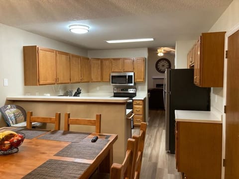 The fully equipped kitchen and diner for 8 people is on the ground level.