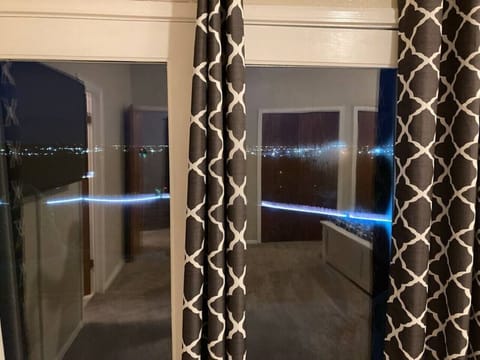 Night view of the surrounding area from the main bedroom.