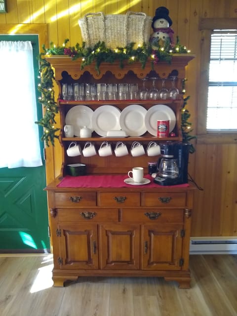 All dinner, glass, silver, and serving ware in hutch