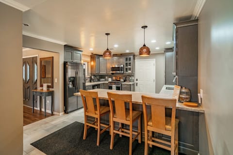 Modern kitchen with barstool seating.
