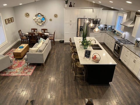 Main Floor is perfect for entertaining, relaxing and enjoying the space as a family or large group. It flows right into the back deck and has plenty of windows and light, for an open and airy feel. 