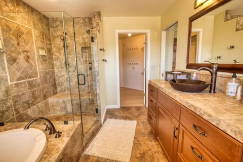 Combined shower/tub, hair dryer, towels, soap