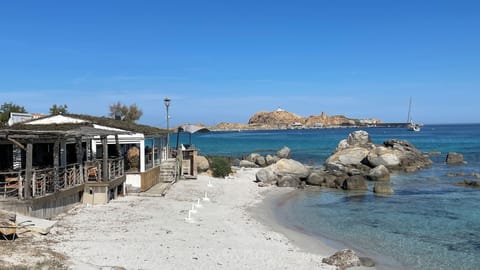 Beach nearby, sun loungers