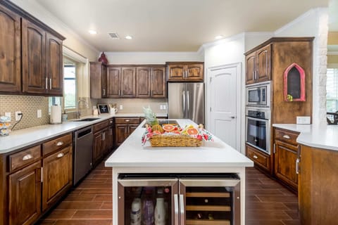 Whip up your family secret recipes here in this gourmet kitchen.
