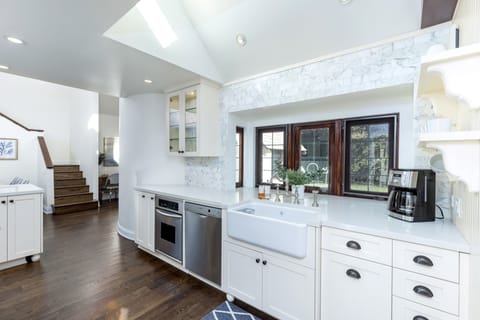 Remodeled kitchen, with custom build-cabinetry and quartz counters.