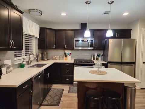 Open kitchen - great prep island and space to hang and enjoy family / friends.