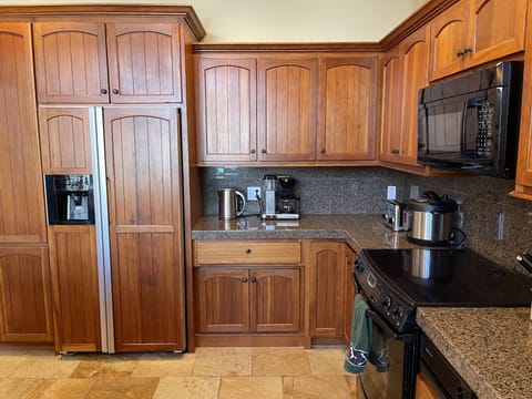 2nd floor: Gourmet kitchen equipped w/ appliances and everything you need.