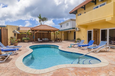 Make the most of your pool time with ample sun loungers and outdoor seating.