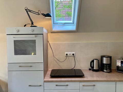 Fridge, microwave, coffee/tea maker, toaster