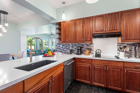 Updated kitchen with view into the dining and living rooms