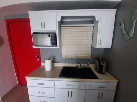 Microwave, oven, coffee/tea maker, cookware/dishes/utensils