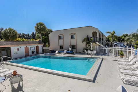 A heated pool, sun loungers