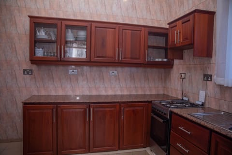 Fridge, microwave, spices, dining tables