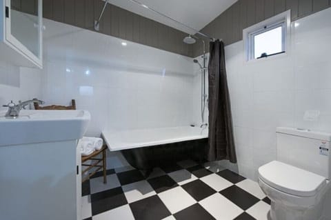 Combined shower/tub, hair dryer, towels, soap