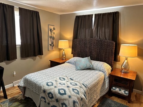 3 bedrooms, blackout drapes, iron/ironing board, travel crib